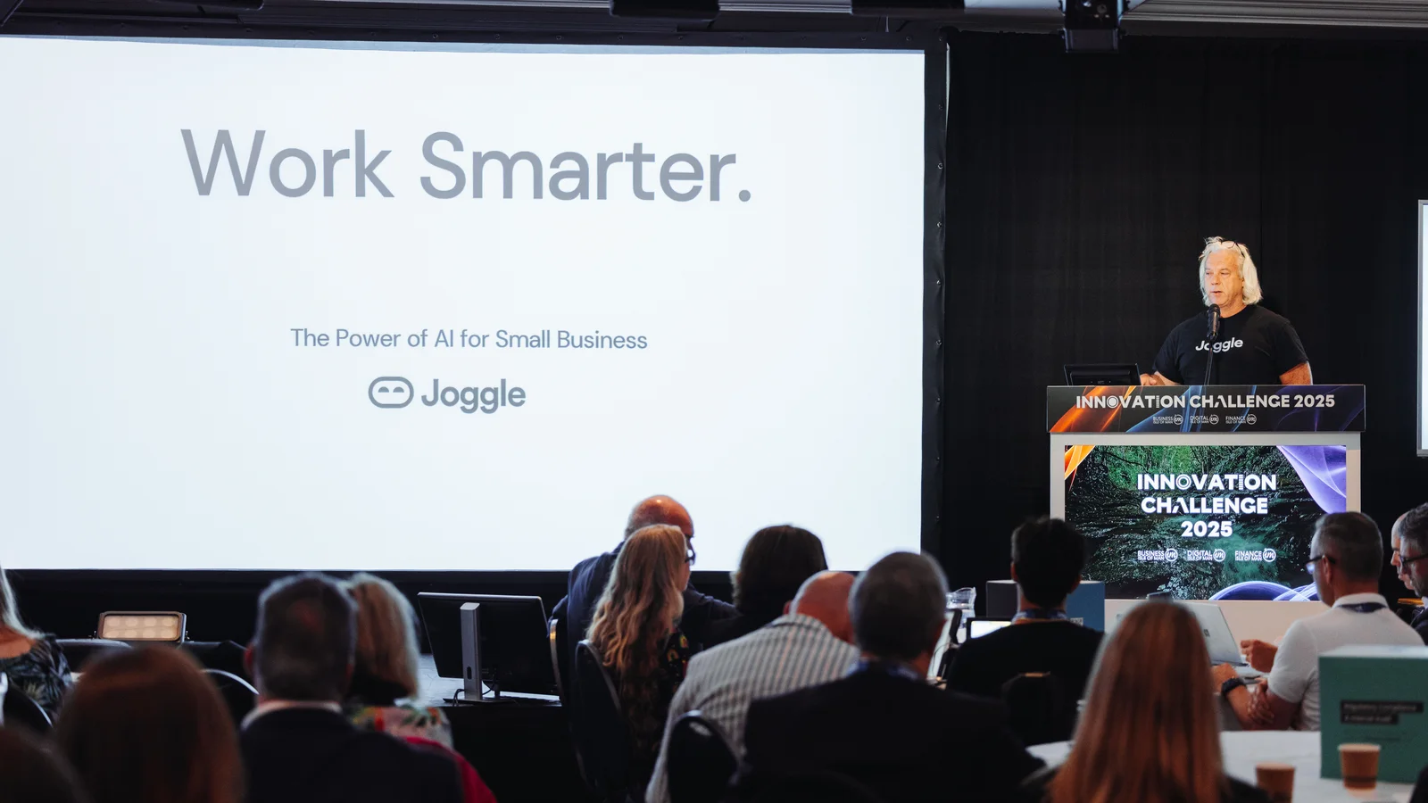 Simon Grice speaking on stage